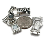 Silver fold over magnetic clasp, double strand. Features 2 holes on each end and cutouts on the back to hide crimp beads or knots. Covered magnet clicks to lock for secure wear. Perfect magnetic bracelet clasp for two‑row gemstone bracelets, seed bead cuffs, and layered necklaces. Ideal jewelry finding for repair and upgrades when you need a strong magnetic necklace clasp.