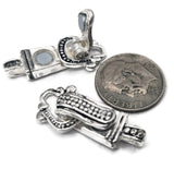 Decorative fold-over magnetic clasps in a bright silver finish are displayed from both front and back views on a white background. The front features elegant scrollwork with heart accents and dark antiqued details that enhance the design. The reverse side showcases raised beaded textures and decorative metalwork. These secure magnetic jewelry clasps are ideal for bracelet making, necklace projects, bead weaving, peyote stitch designs, and other handcrafted jewelry creations requiring attractive, easy-to-use