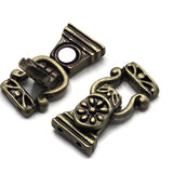 Looking for a decorative clasp that becomes part of your bracelet design? These antique brass fold-over magnetic clasps feature an ornate floral motif with beautiful vintage-inspired detailing. The clasp measures approximately 27.6 mm long with two holes on each end spaced approximately 6.4 mm apart. Perfect for DIY bracelet designs, double-strand jewelry, bead weaving, and handmade jewelry making, the antique brass finish complements turquoise colors, earthy gemstones, glass beads, and rustic jewelry compo