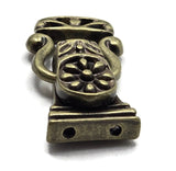 These 2 hole antique brass magnetic clasps provide a beautiful finishing component for DIY bracelets and handmade jewelry. The fold-over design features an ornate floral pattern with darker recessed accents that emphasize its vintage styling. At approximately 27.6 mm long, the clasp offers plenty of visual presence for double-strand bracelet designs. Use it with beads, gemstones, crystals, seed beads, or other jewelry-making supplies to create elegant vintage, rustic, western, bohemian, or nature-inspired j