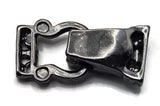 These gunmetal fold-over bracelet clasps offer jewelry makers a decorative alternative to ordinary jewelry closures. An intricate floral motif decorates the top while the polished dark finish adds depth and contrast. Measuring approximately 29 mm long and 8 mm thick, each magnetic clasp has two stringing holes on each end for double-strand bracelet designs. Use them with glass beads, gemstones, crystals, seed beads, and other jewelry-making components for distinctive handmade bracelets.