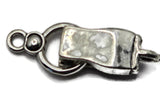 Looking for a silver jewelry clasp without the highly reflective look of polished silver? These Weathered Silver fold-over magnetic clasps feature a darker stainless-steel-like tone with subtle antiqued variations throughout the finish. Each clasp measures approximately 29 mm long and 10 mm wide with one loop on each end. Use these magnetic clasps for bracelets, necklaces, bead weaving, gemstones, crystals, seed beads, chain, and vintage-inspired or contemporary DIY jewelry designs.