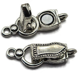 Give handmade jewelry a distinctive finishing touch with these Weathered Silver magnetic clasps. The darker silver plating resembles stainless steel and features uneven antiqued detailing for a subtly distressed, aged-metal appearance. Each fold-over clasp measures approximately 29 mm long and 10 mm wide with a single loop on each end. Perfect for magnetic bracelet designs, bead weaving, necklace making, gemstone jewelry, seed bead projects, DIY bracelets, and other handmade jewelry creations.