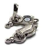 These Weathered Silver magnetic bracelet clasps offer a beautiful alternative to traditional bright reflective silver. The darker metallic finish resembles stainless steel and features irregular detailing that creates a slightly weathered, aged-metal appearance. Measuring approximately 29 mm long and 10 mm wide, each fold-over clasp has one attachment loop on each end. Use these jewelry clasps for bead weaving, gemstone bracelets, necklaces, seed bead cuffs, chain, and handmade jewelry-making projects.