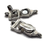 Create bracelets and necklaces with a softer silver finish using these weathered silver magnetic jewelry clasps. Their darker metallic color resembles stainless steel, while irregular antiqued detailing gives the surface a slightly weathered appearance. Each fold-over clasp measures approximately 29 mm long by 12 mm wide with a single vertical loop on each end. These magnetic clasps are excellent for bead weaving, seed bead cuffs, gemstone jewelry, DIY bracelet designs, necklaces, and handmade jewelry makin