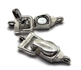 Four single-loop magnetic clasps for bracelet making shown in coordinating silver, gold, antique brass, and antique copper metal finishes. Each fold-over jewelry clasp features a smooth decorative design, magnetic alignment, hinged locking flap, and attachment loop on both ends. The mixed finish assortment makes it easy to coordinate clasps with different beads and jewelry components. Jewelry findings for beaded bracelets, necklaces, handmade jewelry designs, crafting, and jewelry-making projects.