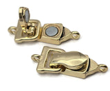 Keep bracelets secure with fold over magnetic closures in gold. The magnet clicks together quickly, then the cover locks to prevent detachment near metal objects. Designed as single strand clasps, they connect via the end loop to jump rings or crimps. These secure magnetic clasps beat lobster clasps for ease and toggles for safety, delivering a chic gold finish for everyday wear.