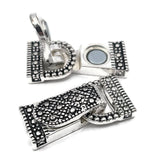 Four decorative 2-hole fold-over magnetic clasps displayed in mixed silver and gold finishes for bracelet and jewelry making. The assortment includes floral, scrollwork, and geometric metal clasp designs with two attachment points at each end. Magnetic alignment makes the clasps easy to close while the hinged fold-over flap provides an additional closure. Ideal jewelry findings for double-strand bracelets, multi-strand beading, handmade necklaces, bead weaving, and jewelry making at home.