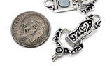 Vintage-inspired single-strand magnetic clasp featuring bright silver metalwork and elegant black enamel scroll patterns. The fold over design provides both security and ease of use while maintaining a decorative appearance. Shown from multiple angles, this bracelet clasp is perfect for jewelry making, handcrafted bracelets, magnetic jewelry closures, beading supplies, and artisan jewelry projects.
