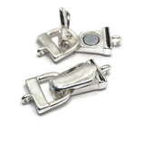 Silver magnetic fold over clasps with attached loops and hinged closure mechanism. The polished finish provides a professional appearance while the magnetic design makes bracelets easier to put on and remove. Perfect for handmade bracelets, jewelry findings, artisan jewelry projects, leather accessories, magnetic bracelet closures, and jewelry making supplies for designers and hobbyists.