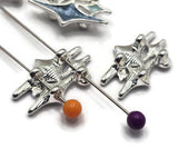 Create standout jewelry with these blue enamel Atomic Star 2 Hole Slider Beads. Inspired by classic 1950s space-age and Las Vegas sign designs, these decorative focal beads add color, sparkle, and dimension to handmade bracelets and necklaces. The dual-hole construction provides excellent strand alignment, making them ideal for multi-strand jewelry, bead weaving, and other creative jewelry making projects.