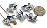 Bring retro style to your jewelry designs with these Atomic Star 2 Hole Slider Beads. Featuring brilliant blue enamel, sparkling clear rhinestones, and a bright silver finish, these focal beads are inspired by the iconic mid-century modern starburst designs of the 1950s. Perfect for bracelets, necklaces, and multi-strand jewelry, their two-hole design keeps strands aligned for a polished, professional finish.