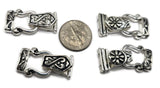 Silver fold over magnetic clasps for bracelet designs, featuring two distinct decorative styles. Each clasp has two holes on each end for secure stringing and a cutout for knots or crimps. These magnetic clasps for jewelry making offer a reliable closure, easy to put on, and safer than open magnetic clasps. Ideal for necklaces, bracelets, and DIY jewelry components.