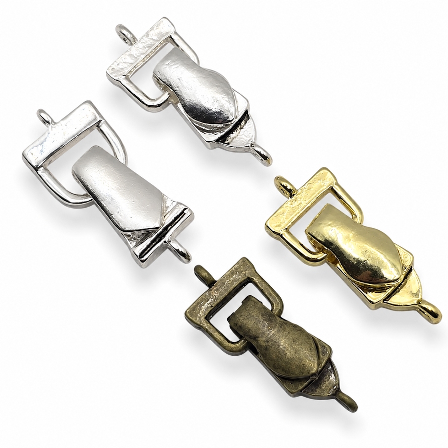 Assorted fold-over magnetic clasps for jewelry making in bright silver, bright gold, and antique gold finishes. This mixed metal clasp assortment includes four single-loop magnetic clasps with secure fold-over closures. Ideal for bracelet making, necklace designs, beading wire, leather cord, ribbon jewelry, and handmade jewelry projects. Smooth metal finishes coordinate easily with beads, charms, chain, and jewelry findings while providing an easy-to-use magnetic jewelry clasp closure.