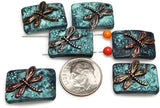 The combination of the antique patina finish and the metal dragonfly design creates a stunning contrast that adds depth and character to any piece.