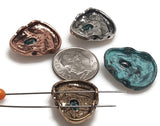 Celebrate ocean life with these colorful sea turtle 2-hole slider beads. Each bead features a turtle swimming across a shoreline-inspired design in antique silver, bronze, or copper with turquoise, gold, and red accents. Perfect for nautical, boho, or coastal jewelry, these beads work beautifully in bracelets, chokers, or beach-inspired necklaces. The dual-hole design ensures stability, making them great for artisan jewelry creations and seaside gifts.