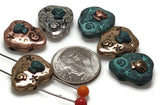 Bring the ocean to life in your designs with these beach-themed 2-hole slider beads. Featuring seashell, spiral, and starfish motifs, these rustic beads come in mixed finishes of copper, gold, silver, and turquoise patina. Ideal for nautical or bohemian-style necklaces and bracelets, their dual-hole construction ensures strands stay aligned. Perfect for creating festival jewelry or beach-inspired gifts for salty souls and ocean dreamers.