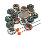 Desert-themed 2 hole slider beads featuring a raised cactus on a hammered coin. Antiqued silver, copper, brass, and verdigris finishes highlight the relief work. Use as focal beads for bracelet stacks or as necklace pendants. Search terms: saguaro bead, cactus focal bead, boho desert bead, mixed metal beads, western jewelry components.