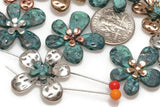 The mixed metal floral beads work beautifully as connectors, focal pieces, or decorative elements in handmade jewelry making.