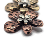 The flower-shaped design adds a delicate and timeless element to your jewelry, making them perfect for bracelets, necklaces, and earrings.