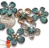 With an antique-inspired floral design, these double-strand slider beads add a vintage touch to your DIY jewelry projects.