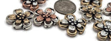 Add charming floral accents to your crafting projects with these mixed-tone flower beads. Perfect for DIY jewelry, friendship bracelets, and gifts. The durable metal construction ensures lasting beauty.