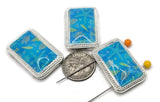 Bright silver 2 hole slider beads with glossy ocean‑blue panels featuring tiny seashells and starfish. These rectangular metal beads act as focal sliders, spacers, or connector components for bracelets, chokers, and necklaces. Frame with seed beads as filler beads, add pearls or crystals for beach sparkle, or mix with sea‑glass colors for coastal palettes. Ideal beading components and findings for jewelry making, summer collections, beach weddings, and small‑batch wholesale.
