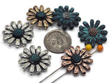Daisy flower 2‑hole slider beads in antique silver, warm copper, and teal verdigris. Each bloom has dimensional petals and a textured center that pops in photos. Use as bracelet centerpiece, spacer bar, or pendant bar charm for layered chokers. Perfect for spring jewelry, cottagecore styles, bridesmaid gifts, and garden‑theme stacks. Pair with pearls, crystals, or seed beads for bright, giftable designs.