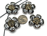 Celebrate positivity with these flower 2-hole slider beads. Each antique silver bead highlights a gold-bronze spiral center surrounded by engraved petals inscribed with uplifting words like Hope, Faith, Love, Wish, and Joy. Strong dual-hole slider construction keeps strands flat and secure, perfect for creating one-of-a-kind chokers, necklaces, or wide bracelets. Ideal for inspirational jewelry collections, bohemian gifts, and artisan handmade designs.