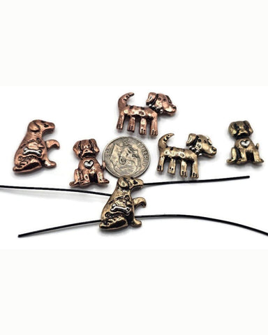 These rustic dog 2-hole slider beads are perfect for animal lovers and artisan jewelry. Made in antique copper and bronze finishes, each bead features playful pup designs with details like hearts, bones, or collars. The dual-hole design keeps strands flat and aligned, making them ideal for bracelets, chokers, and necklaces. Great for boho artisan collections, handmade pet memorial gifts, or whimsical dog-themed accessories.