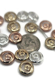 Add movement and flow to your jewelry with these spiral swirl 2 hole slider beads. Each bead is crafted in a round form with a central swirl motif, available in three metallic finishes: silver, bronze-gold, and warm copper. Their two-hole design helps beads sit flat, making them excellent as bracelet sliders, necklace focal points, or decorative spacers in layered projects. Measuring about the size of a US dime, they’re lightweight yet bold enough to stand out.