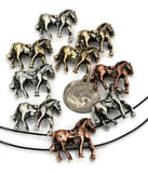 Celebrate the power and spirit of the horse with these equestrian slider beads. Each bead features a galloping horse design, finished in silver, copper, or bronze, perfect for rustic and cowboy jewelry styles. With their two-hole construction, the beads sit evenly and securely in bracelets and necklaces, offering stability for multi-strand projects.