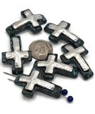 Celebrate faith and artistry with these antique cross 2-hole slider beads. Designed with a silver cross center surrounded by a distressed patina frame, they add rustic charm to your jewelry projects. The slider style ensures strands stay secure and flat, perfect for leather cuffs, chokers, and symbolic necklaces. Wonderful for Christian gifts, artisan boho designs, or Western-inspired accessories full of meaning.
