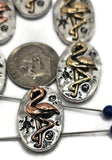 Add tropical flair to your creations with these flamingo 2-hole slider beads. Crafted in antique silver with warm copper and bronze accents, each oval bead showcases a detailed standing flamingo. Their dual-hole construction keeps strands flat and secure, making them perfect for chokers, leather cuffs, and artisan necklaces. Great for summer jewelry, boho accessories, or handmade gifts for beach and nature lovers.