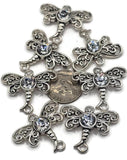 These dragonfly connectors add whimsical elegance to handmade jewelry. Each connector features filigree-style wings in antique silver, accented with a sparkling rhinestone center. With loops at both ends, they work beautifully in bracelets, earrings, chokers, or multi-strand necklaces. Perfect for artisan boho jewelry, nature-inspired designs, or handmade gifts, these connectors bring sparkle and meaning to every creation.