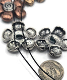 Celebrate meaning in your jewelry designs with these antique-style flower slider beads. Each two-hole bead is engraved with uplifting words—Faith, Love, Hope, Joy—that inspire positivity and beauty. Ideal for bracelets, chokers, or multi-strand necklaces, these artisan connectors feature rustic mixed-metal finishes that complement a variety of creative styles. Perfect for crafters, jewelry makers, and Etsy sellers looking for unique statement components.