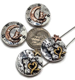 Beautiful round 2 hole slider beads featuring celestial designs — two cats forming a heart beneath starry skies and single cats resting on crescent moons. Crafted in mixed metal finishes of silver, bronze, copper, and gold, these beads make perfect focal accents for handmade bracelets, pendants, and necklaces.