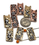 Whimsical silver cat slider beads with gold and red enamel-style tails forming hearts. These 2 hole focal beads are great for bracelet centers, necklace pendants, or boho jewelry designs.