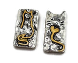 Cute silver cat slider beads with heart-shaped tails, designed in red and gold accents. These 2 hole focal beads add playful detail to handmade necklaces, bracelets, and pendants.