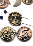 These round moon and cat slider beads capture whimsical celestial charm. Designed with two holes for alignment, they’re perfect focals for bracelets and pendants. Each bead features cats on crescent moons or nestled under stars and hearts in antique brass, copper, and silver finishes. Ideal artisan jewelry supplies for boho, pet‑themed, or mystical handmade keepsakes celebrating love and starlight.