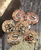 Design artisan jewelry with these enchanting cat moon slider beads. Each round bead shows delightful celestial detail—cats resting on crescents or snuggled under stars—with heart accents. Available in antique silver, brass, and copper finishes, they feature dual holes for secure alignment. Excellent statement focals for bracelets or necklace pendants, they’re perfect supplies for celestial, boho, or symbolic handmade jewelry.