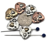 These seashell 2‑hole slider beads capture coastal inspiration in every detail. Featuring raised scallop shells, swirls, and stars in a pebble‑shaped design, they come in antique silver, brass, and copper finishes. Dual holes make them perfect for stable placement in multi‑strand bracelets or handcrafted pendants. Great artisan components for ocean‑inspired, bohemian, or beach‑themed jewelry projects and handmade gifts.