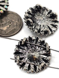 Add sparkle and bold color to your creations with these floral 2 hole slider beads. Each round bead showcases a turquoise cabochon center encircled by silver petals and shimmering rhinestone accents. With a two-hole slider design, they sit flat and secure, ideal for statement bracelets, necklaces, and chokers. Perfect for boho chic, Western, or show-stopping designs, these beads are durable and lightweight, making them fantastic as focal points in handmade artisan jewelry.