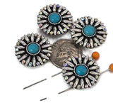 Bring dramatic beauty to your work with these turquoise rhinestone floral slider beads. Crafted in a burst-style round shape, they feature turquoise cabochon centers framed by shining rhinestones and silver metal petals. The dual-hole slider style ensures that beads stay flat, creating balanced and professional-looking pieces. Excellent for festival jewelry, bohemian styles, or bold fashion accessories, these beads are ideal as focal beads for necklaces, chokers, or multi-strand bracelets.