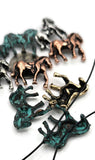 These equestrian slider beads highlight detailed horse designs in silver, bronze, rustic copper, and turquoise patina finishes. Great for multi-strand jewelry projects, the two-hole slider format ensures your designs sit balanced and flat. Perfect for Western lovers, these beads work beautifully as focal beads, spacers, or pendants in bracelets, chokers, and artisan necklaces.