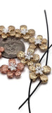 Featuring hammered textures and silver accents, these flower 2 hole slider beads are available in copper and gold finishes. Their rounded petals bring depth and detail, perfect for bracelets, chokers, necklaces, or multi-strand jewelry projects. Durable yet lightweight, they sit flat and stable through two-hole slider construction. Great for DIY crafters building floral, vintage, or bohemian jewelry lines.