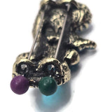 These ornate botanical sliders spotlight faceted berry‑tone resin stones with aurora crystal accents. Antique brass/gold frames feature beaded bezels and sculpted leaves. Dual threading ensures alignment for multi‑strand bracelets or collar necklaces. Ideal for fairytale, vintage, and cottagecore jewelry with luxurious color and secure construction.