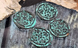 Bring artisan character to your jewelry with turquoise‑patina filigree 2‑hole sliders. The round medallion showcases ornate floral cutouts with a weathered verdigris finish over deep gunmetal tones. Two holes ensure secure alignment in bracelets and necklace center bars. Ideal focal components for bohemian, rustic, and Mediterranean‑inspired collections seeking bold color and lightweight dimension.