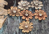 Meaningful and stylish, these inspirational flower sliders feature engraved petals and a clear rhinestone center. Mixed-metal finishes blend beautifully with turquoise, leather, and crystals. The dual-hole design keeps beads flat and stable, making them ideal focal beads for bracelets and layered necklaces. Great for boho, mindfulness, and encouragement jewelry. Craft thoughtful gifts with positive words that resonate every day.