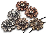 Create affirmation jewelry with these 2 hole flower slider beads featuring engraved words—Faith, Peace, Dream, Love—and a bright crystal center. Available in silver, copper, and antique gold finishes, they add sparkle and meaning to your designs. The dual-hole layout keeps beads aligned, ideal for bracelets, chokers, and layered necklaces. Perfect focal beads for boho chic and mindful, inspirational accessories.